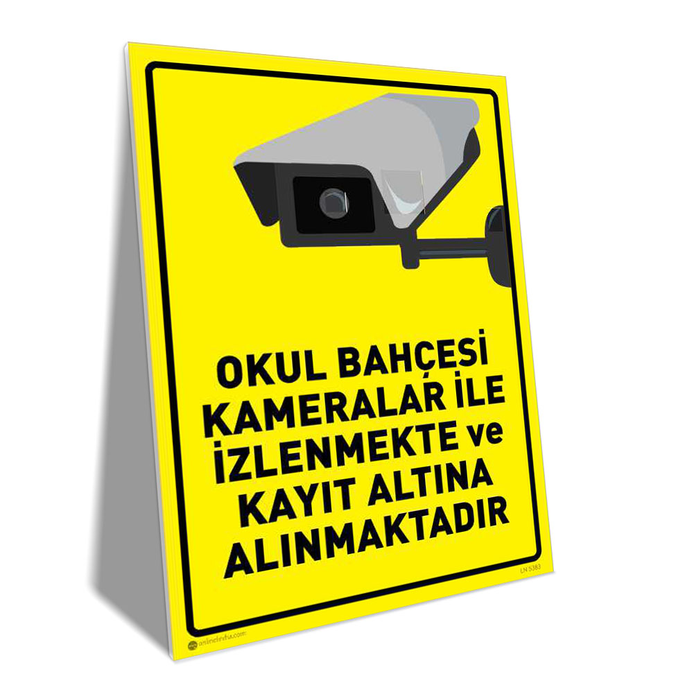 Okulumuz Bahçesi Kameralar İle İzlenmekte Kayıt Altına Alınmaktadır Yellow warning sign with a CCTV camera illustration and Turkish text warning that the school yard is under surveillance and recording.