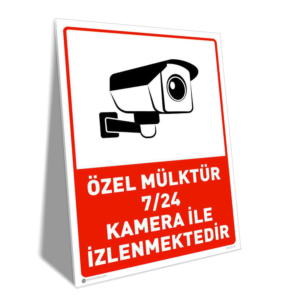 Özel Mülktür Kamera İle İzlenmektedir Signboard with a black CCTV camera illustration and Turkish text stating 24/7 surveillance.